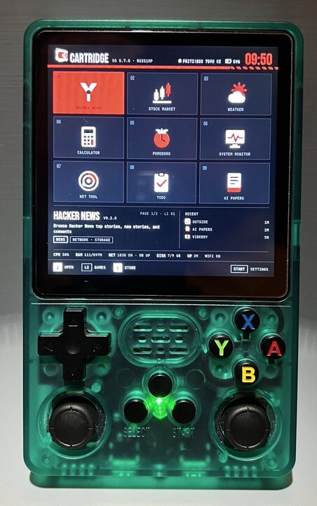 A translucent green R36S Plus displaying the CartridgeOS app grid