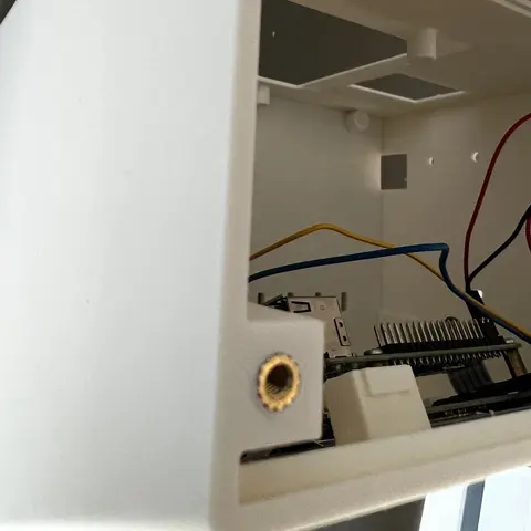 The Raspberry Pi, screen mounts and wiring inside the display bay